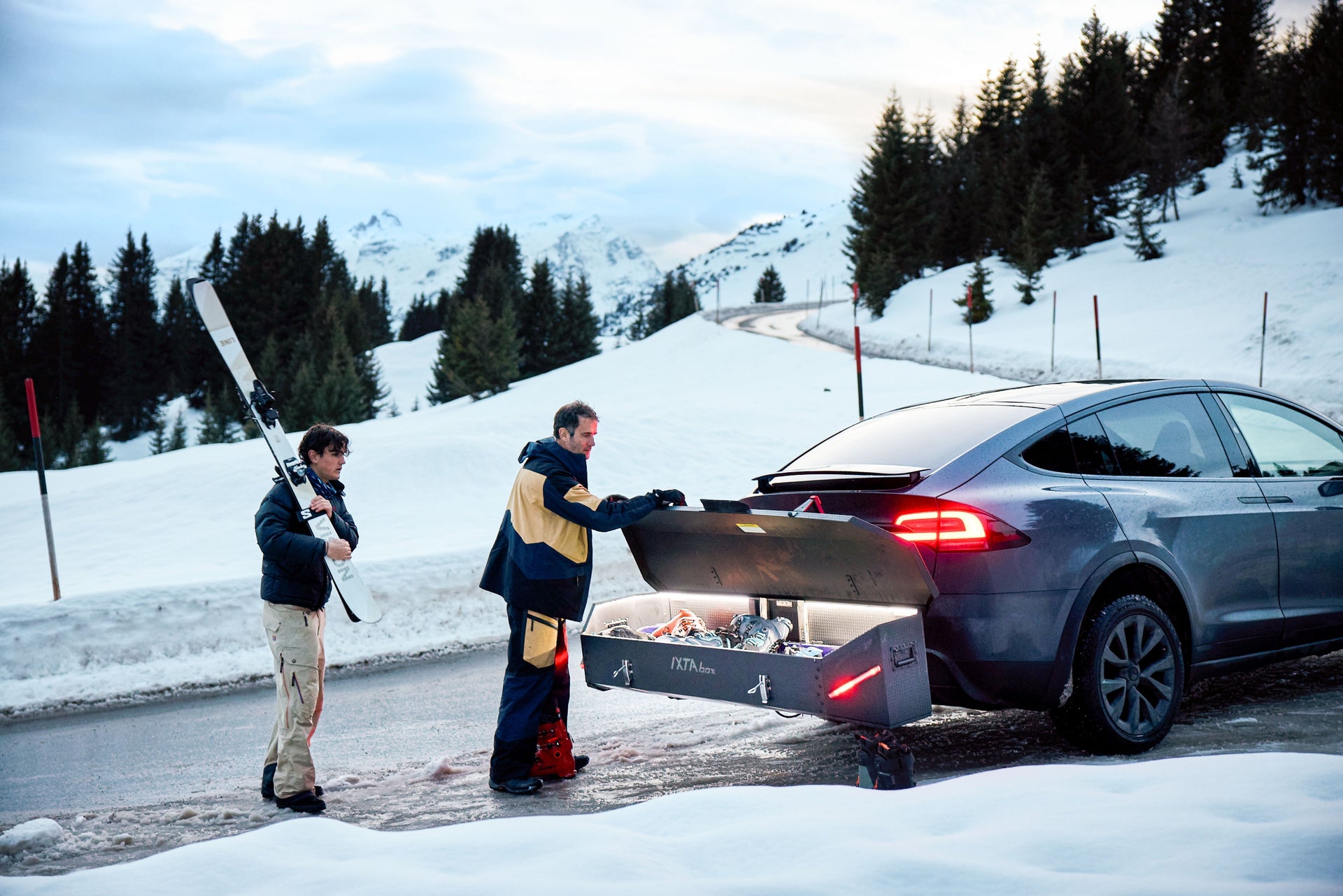Can I carry skis or snowboards inside a roof box?
